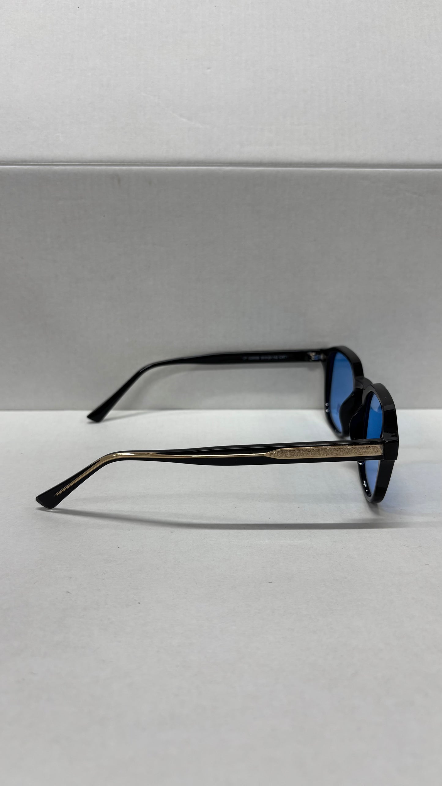 Lunettes 100% UV PROTECTION - bleu noir or brillant