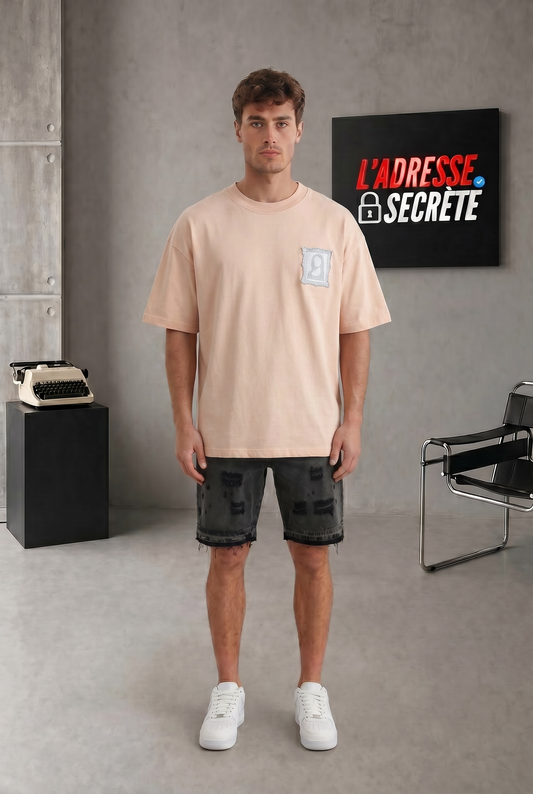 T-shirt ‘Louvre Edition’ – Mona Lisa rose nude / pêche clair pastel.