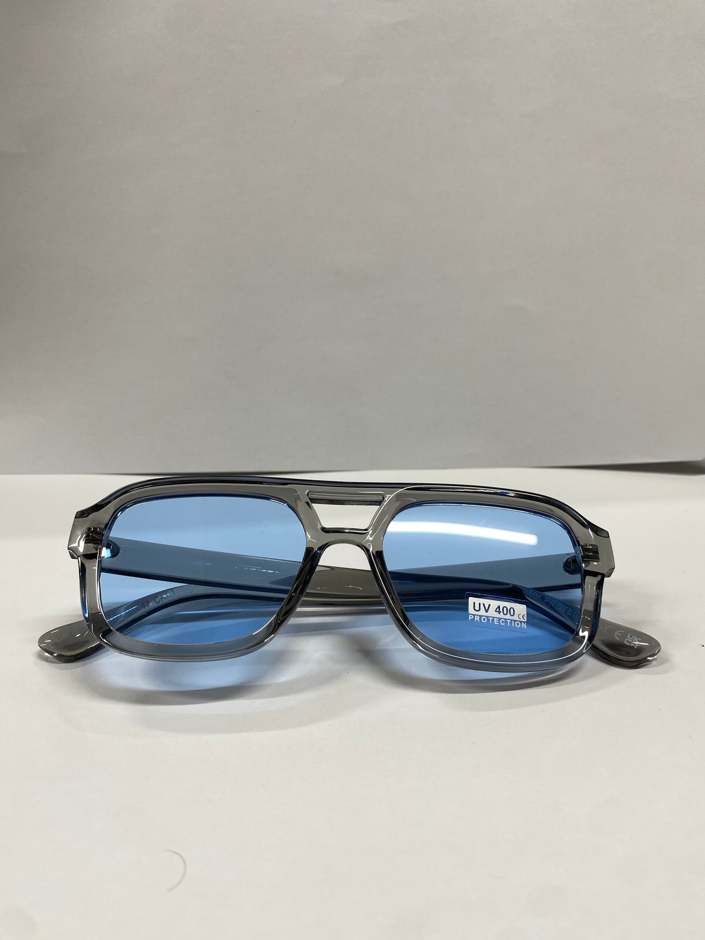 Lunettes de Soleil - 100% UV PROTECTION Teinte Bleu ciel