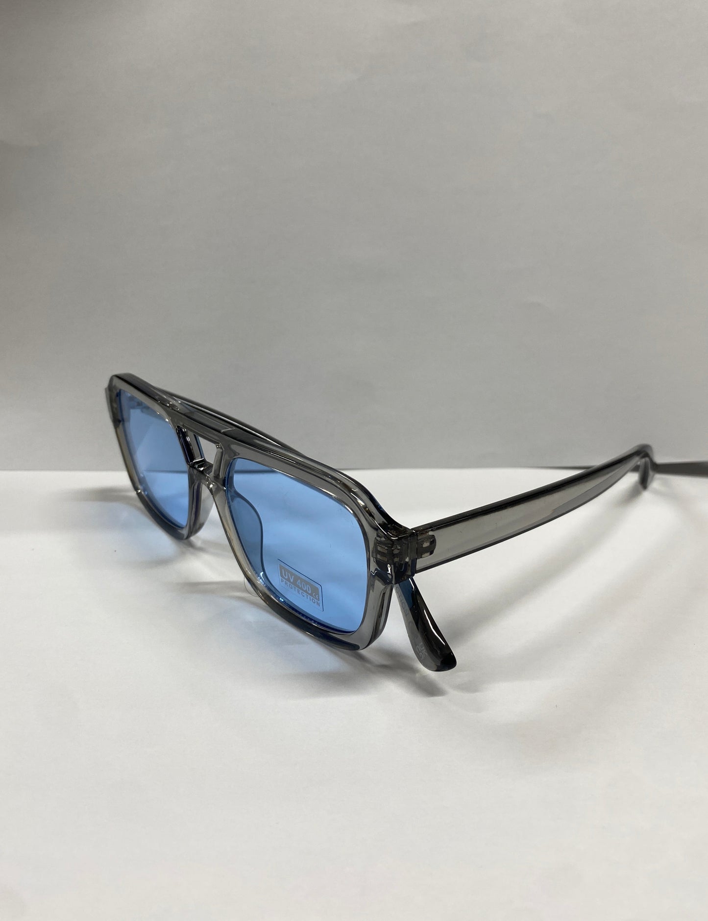 Lunettes de Soleil - 100% UV PROTECTION Teinte Bleu ciel